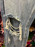 Jeans rotos perlas