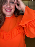 Blusa volante naranja