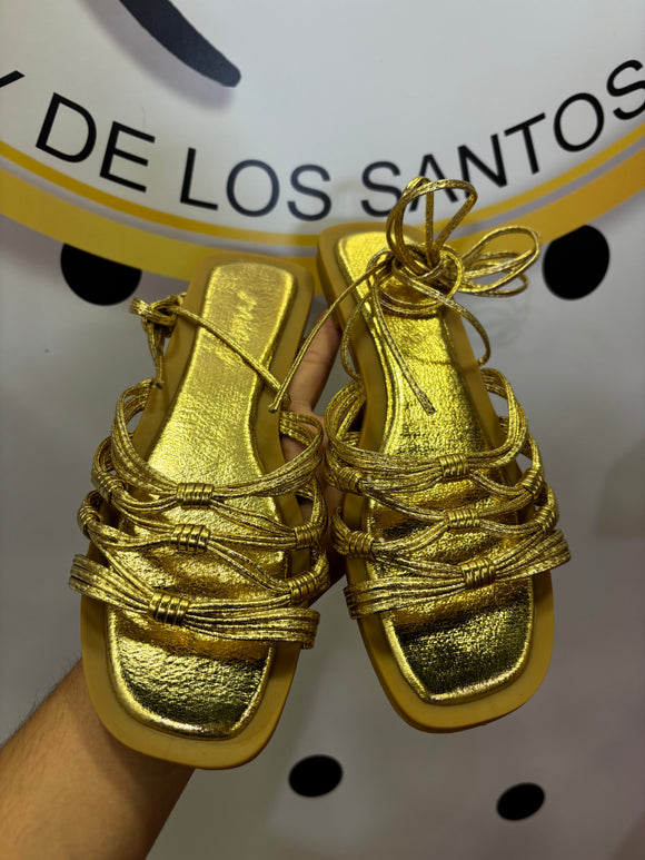 Sandalias romanas doradas